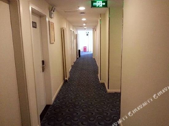 Фото 7 Days Inn Tianjin Bin Hai New Area Yu Jia Bao Bund Park