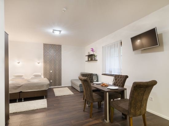 Фото Paulay Downtown Apartments