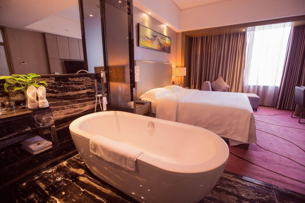 Фото La Perle International Hotel