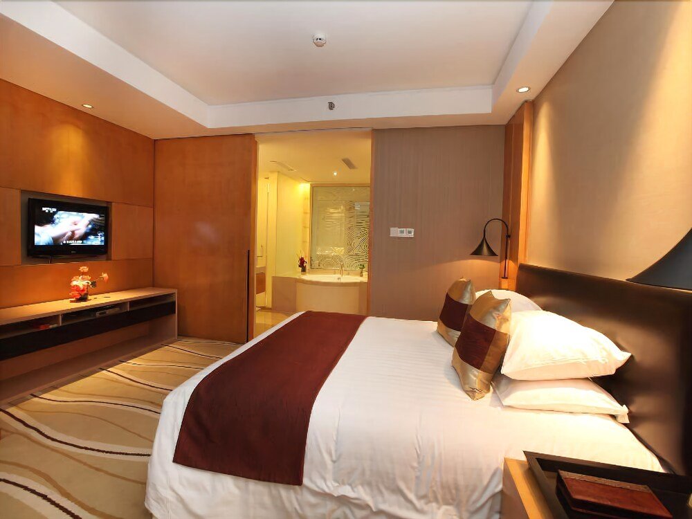 Фото New Century Hotel Pujiang