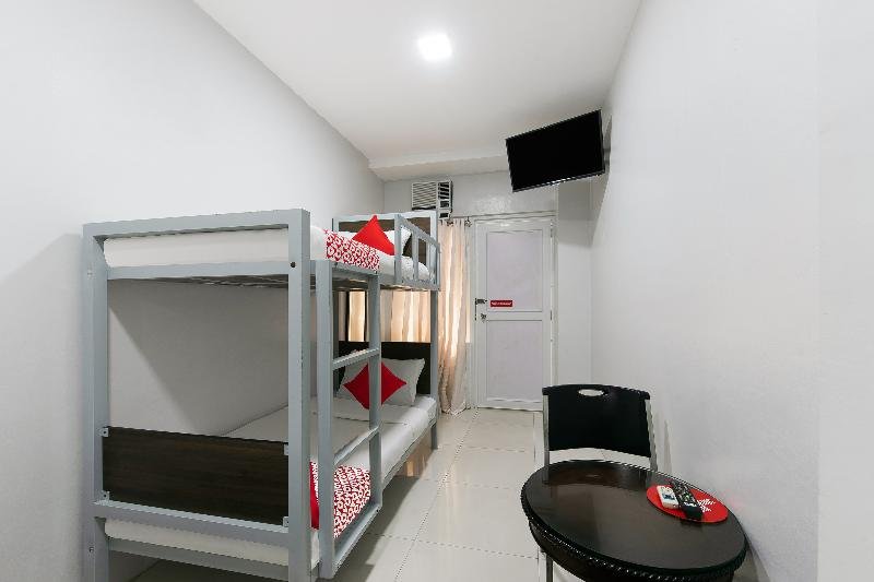 Фото Oyo 152 Sangco Condotel