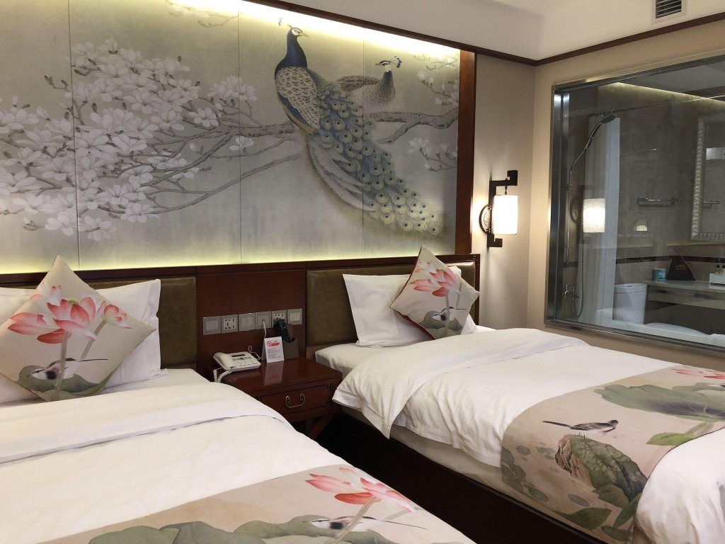 Фото Yitingzhenshe Hotel