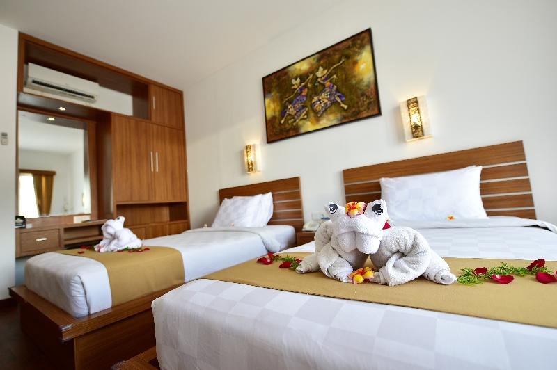 Фото Satriya Cottages