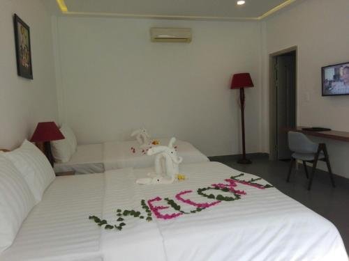 Фото Damina Boutique Hotel