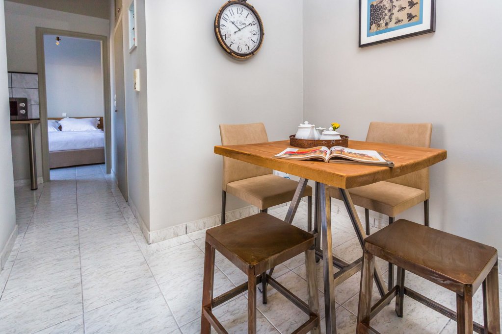 Фото Aris Athens Suites