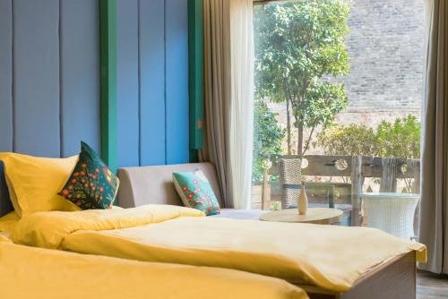 Фото The Ritz-Man Boutique Inn Lijiang