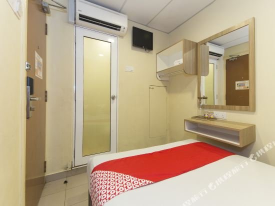 Фото Oyo 615 Dragon Inn Premium Hotel