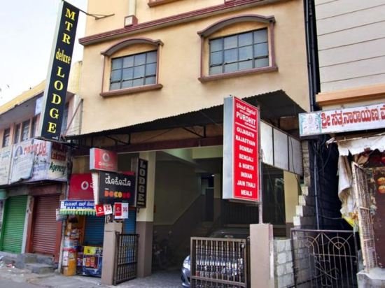 Фото Mannars Deluxe Lodge