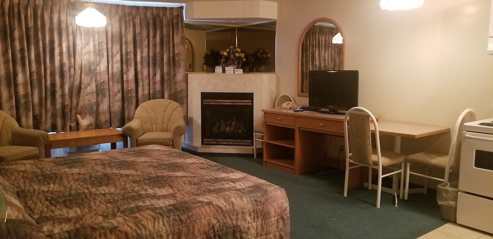 Фото Western Budget Motel Whitecourt 3