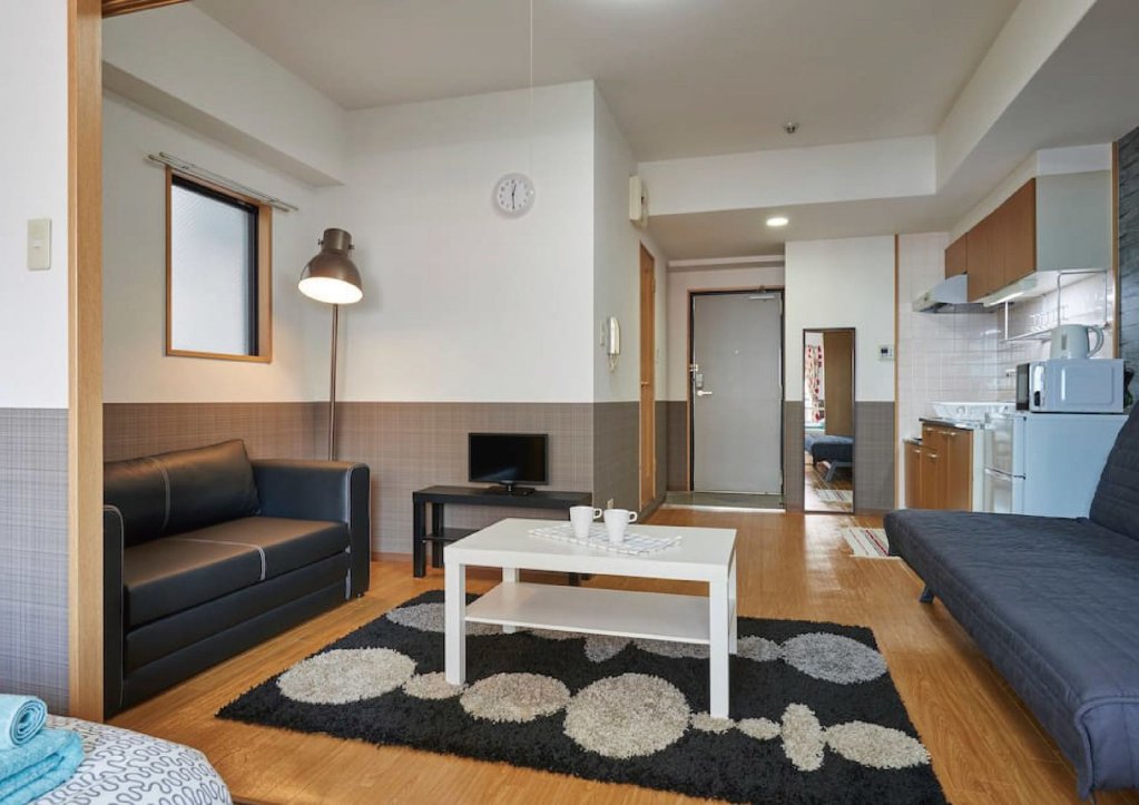 Фото Grande Famille Shimanouchi Dotonbori Condo