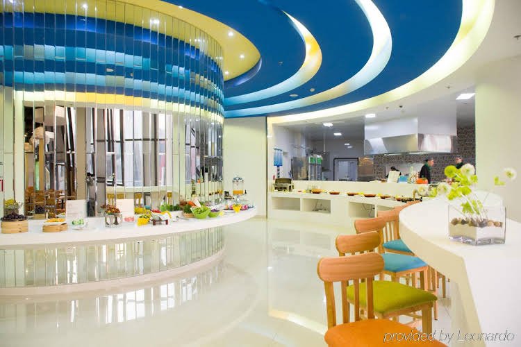 Фото Vatica Qingdao Licang Xiazhuang Hexie Plaza Hotel