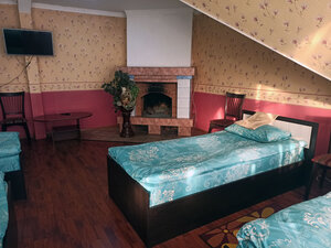 Cafe, Hotel by The Fireplace (Sovetsk, ulitsa Stroiteley, 35), hotel