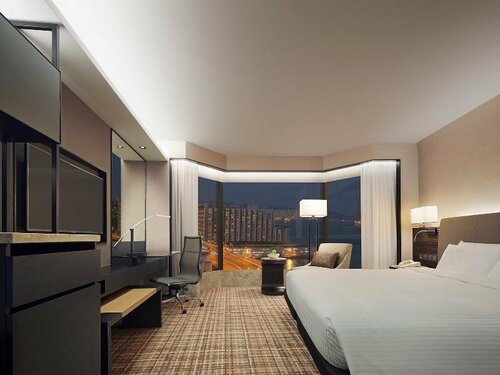 Внешний вид отеля New World Millennium Hong Kong Hotel в Цзюлуне, фото 5