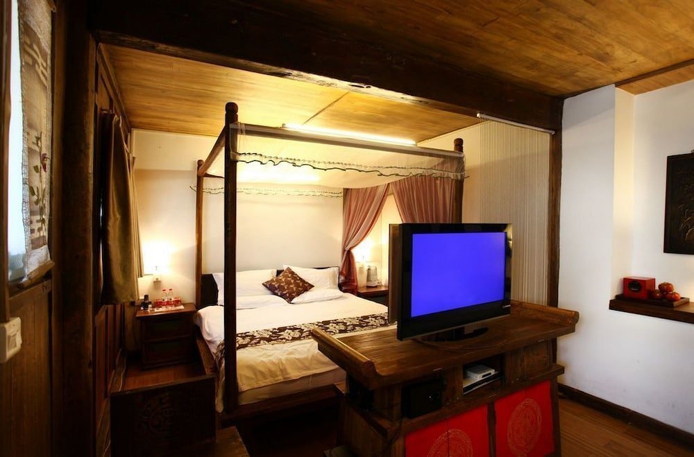 Фото Merry Inn Lijiang