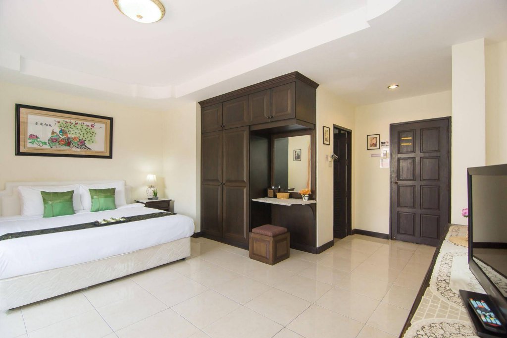 Фото Happys Guesthouse Pattaya