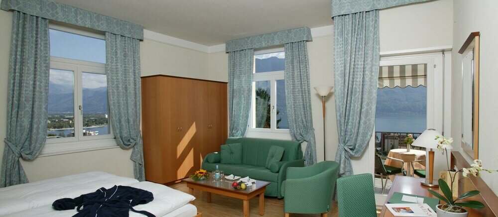 Фото E-Rooms Minusio