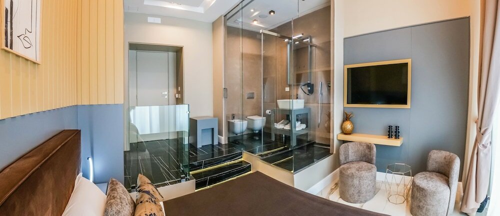 Фото Maison San Carlo Luxury Suites