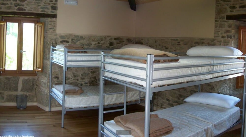 Фото Pensión Albergue Los Caminantes - Hostel