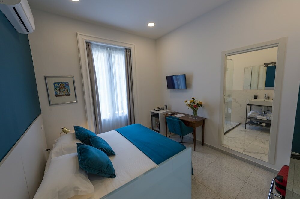 Фото Le Angioine Rooms