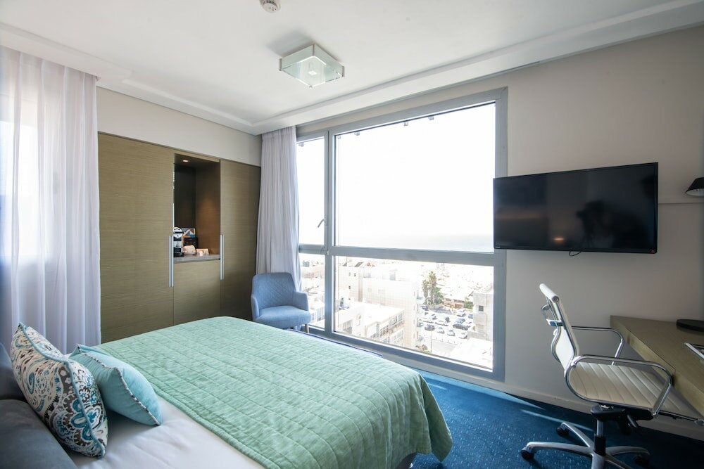 Фото Tal by the Beach - an Atlas Boutique Hotel