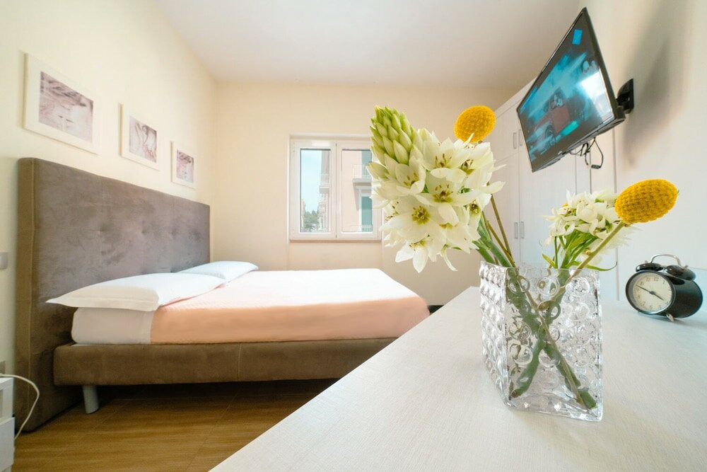 Фото Porta Maggiore Deluxe Center City Rooms