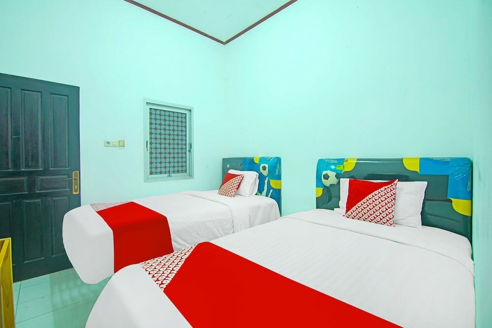 Фото Oyo 91730 De' Mande Homestay Syariah