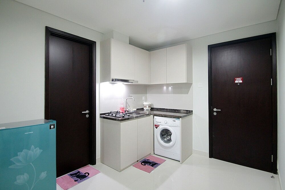 Фото Puri Mansion Apartment