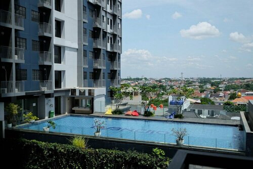 Гостиница Combined 3Br Apartment Without Living Room At Evenciio Margonda в Депоке