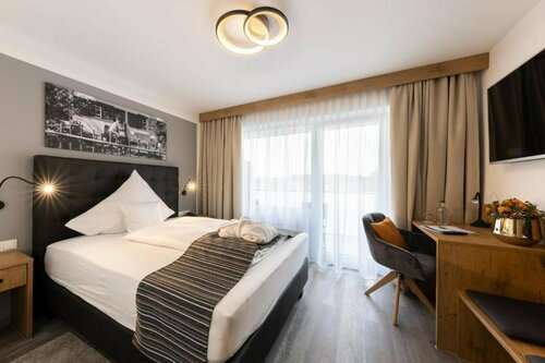 Внешний вид отеля Hotel Tanneck в Бад-Вёрисхофене, фото 4