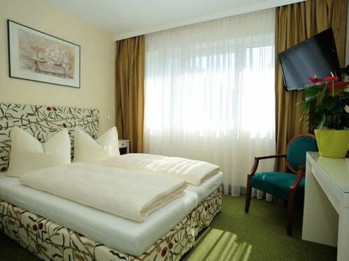 Гостиница Alpha Hotel Hermann von Salza в Бад-Лангензальца