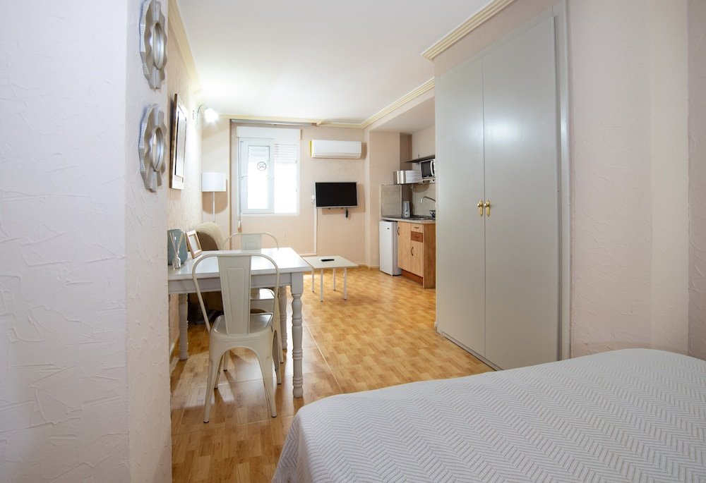 Фото Unique Hotel Apartments