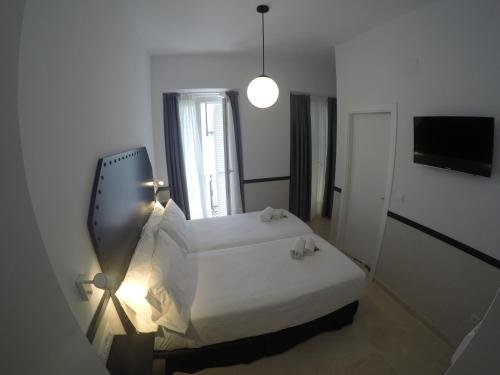 Фото Hostal Hom Museo