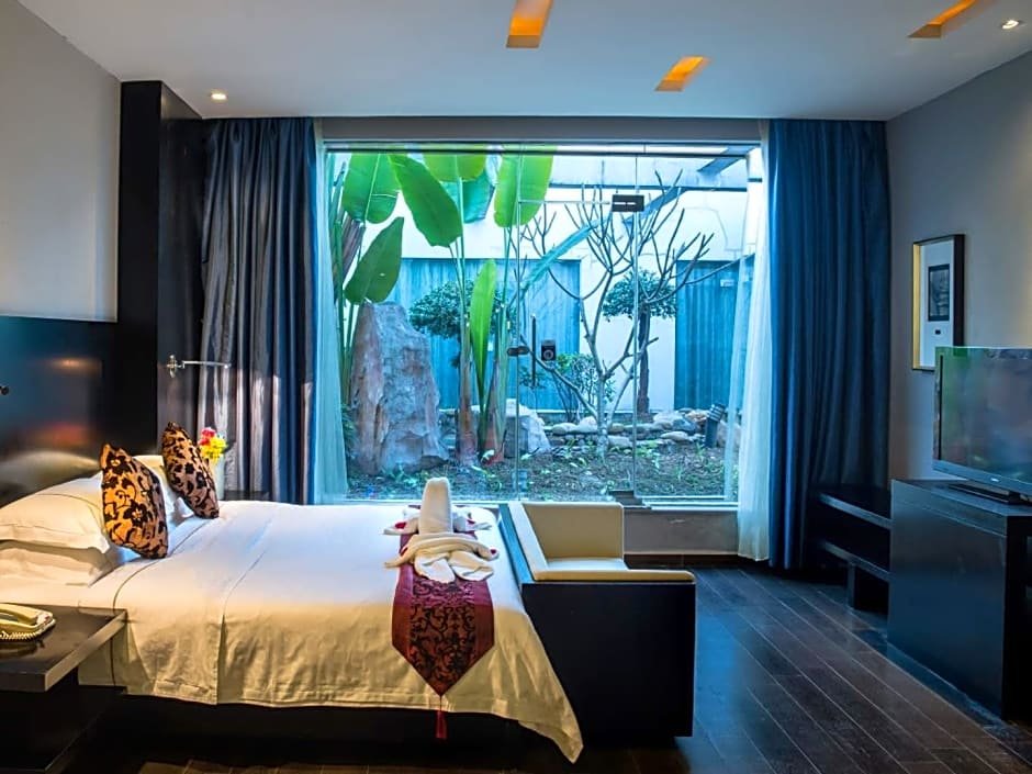 Фото Guangdong Nanmei Osotto Hotel