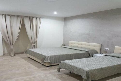 Гостиница Napoli City Rooms в Неаполе