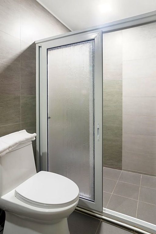 Фото Oyo 208 Anika Suites