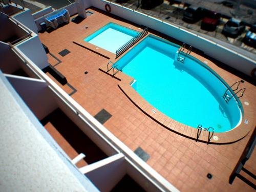 Фото Apartamentos Puerto Bello