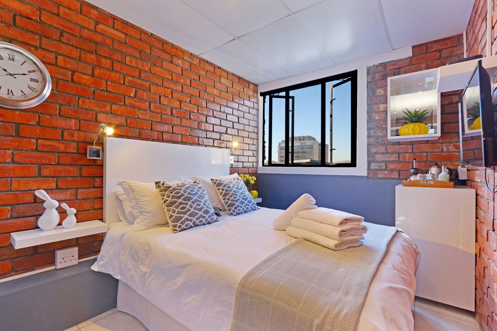 Фото Happy Rhino Hotel