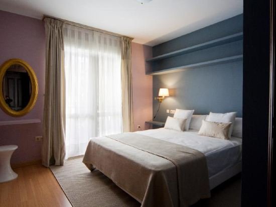 Фото Hotel Boutique Villa Lorena by Charming Stay