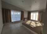 Sport Hotel (Republic of Tatarstan, Tukaevskiy District, Azmushkinskoye selskoye poseleniye, territoriya Naikom Ekstrim Motokross, ulitsa Naikom Arena, 1) ، فندق