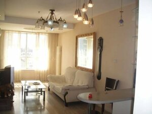 Апартаменты Dalian Xiu Zhu Mansion Apartment