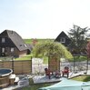 Snug Holiday Home in Herkingen with Hot Tub in Garden