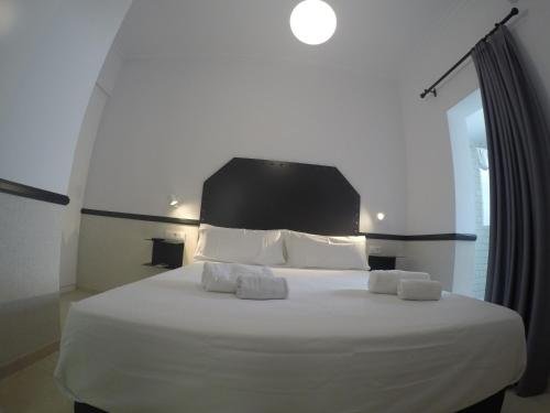 Фото Hostal Hom Museo