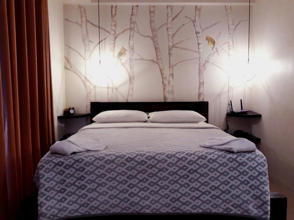 Фото Tess and Tessha Condotel near T3 Airport