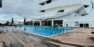 Гостиница The Streamliner Hotel Apartment