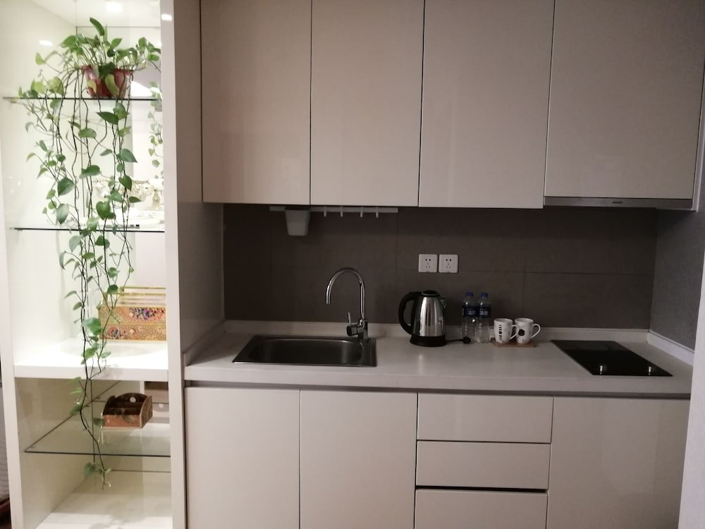 Фото Tianjin G'apartment