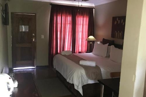 Фото Africa Footprints Guest House