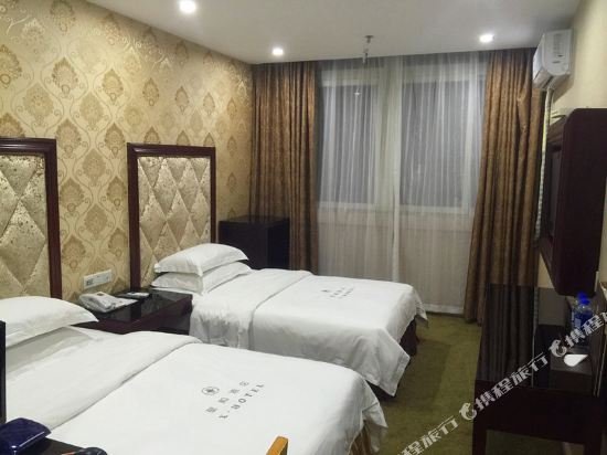 Фото Tai Xiang Business Inn