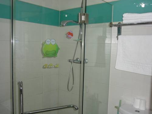 Фото Dalian Xiu Zhu Mansion Apartment