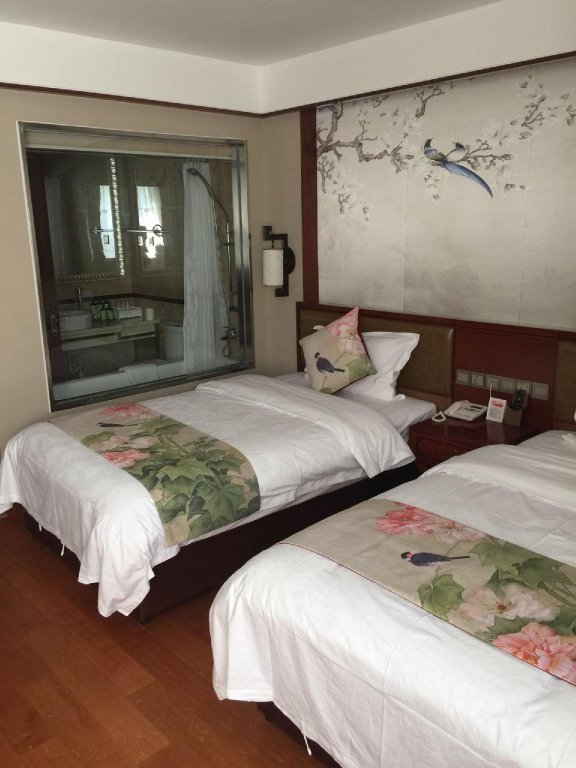 Фото Yitingzhenshe Hotel