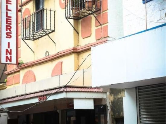 Фото Travellers Inn Mumbai